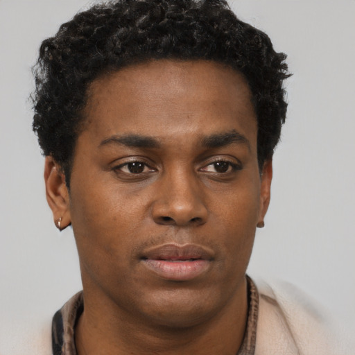 Neutral black young-adult male with short  brown hair and brown eyes