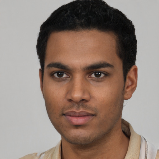 Neutral latino young-adult male with short  black hair and brown eyes