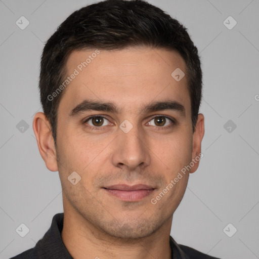 Joyful white young-adult male with short  brown hair and brown eyes