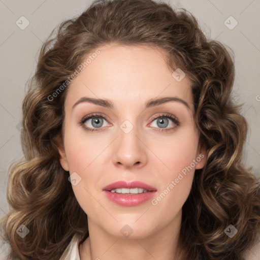 Joyful white young-adult female with long  brown hair and green eyes