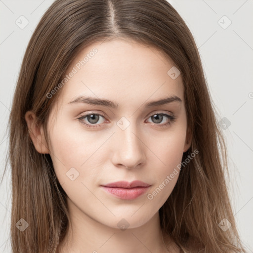 Neutral white young-adult female with long  brown hair and brown eyes