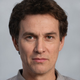 Neutral white adult male with short  brown hair and brown eyes