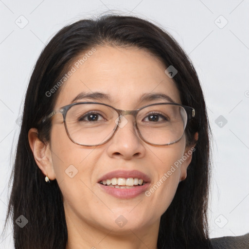 Joyful white adult female with long  brown hair and brown eyes