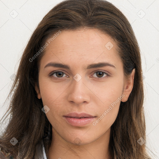 Neutral white young-adult female with long  brown hair and brown eyes