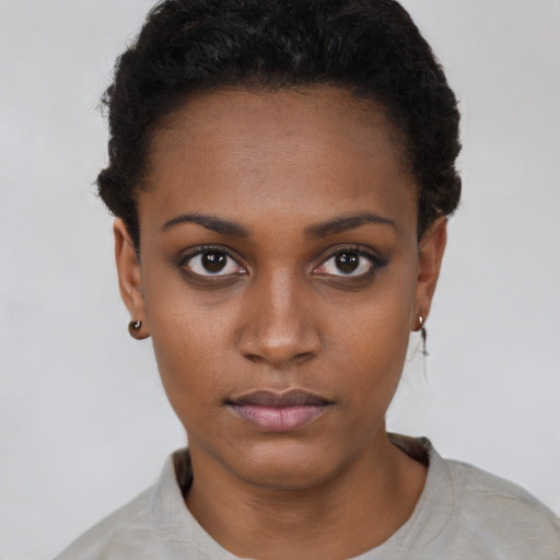 Neutral black young-adult female with short  black hair and brown eyes