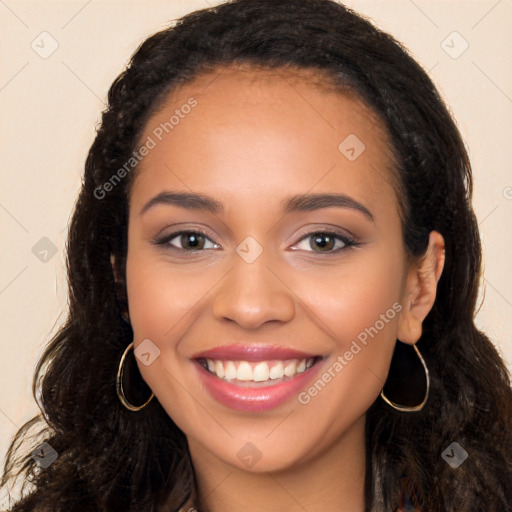 Joyful latino young-adult female with long  brown hair and brown eyes