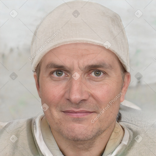 Joyful white adult male with short  brown hair and grey eyes