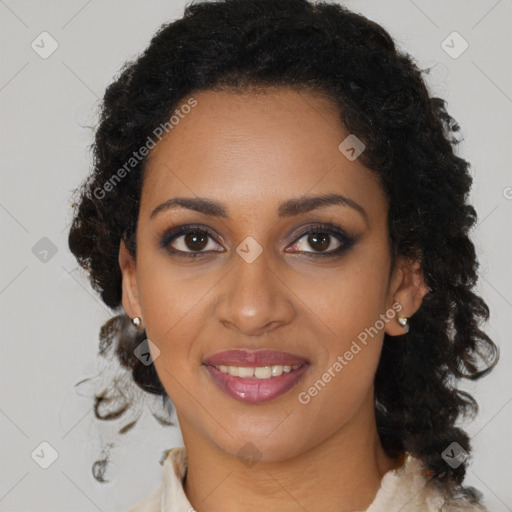 Joyful black young-adult female with medium  brown hair and brown eyes