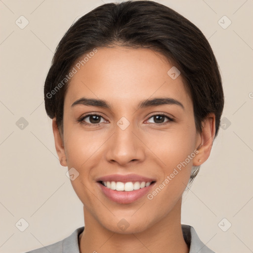 Joyful white young-adult female with short  brown hair and brown eyes