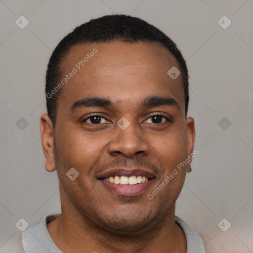 Joyful latino young-adult male with short  brown hair and brown eyes