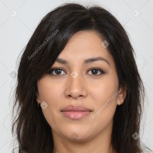 Joyful latino young-adult female with long  brown hair and brown eyes