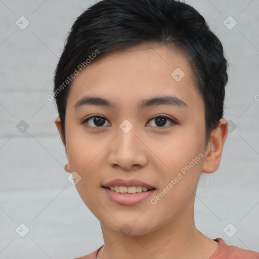 Joyful asian young-adult female with short  black hair and brown eyes