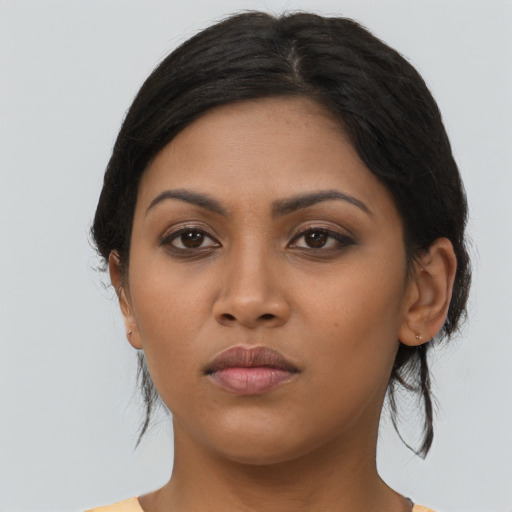 Neutral latino young-adult female with medium  black hair and brown eyes
