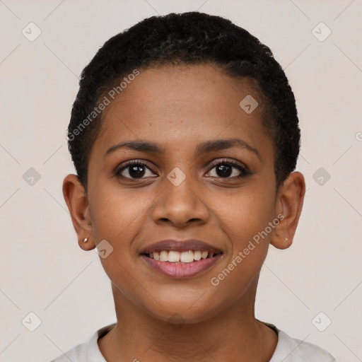 Joyful black young-adult female with short  black hair and brown eyes