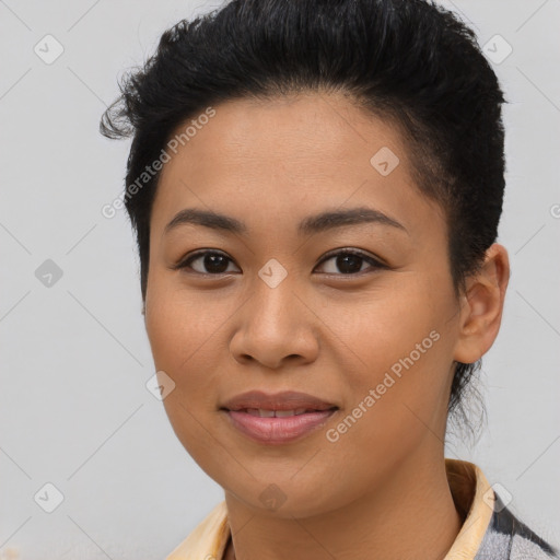 Joyful latino young-adult female with short  brown hair and brown eyes