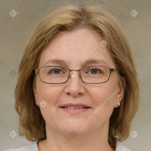 Joyful white adult female with medium  brown hair and blue eyes