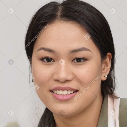 Joyful white young-adult female with medium  brown hair and brown eyes