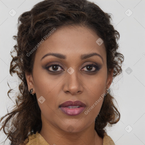 Joyful black young-adult female with medium  brown hair and brown eyes