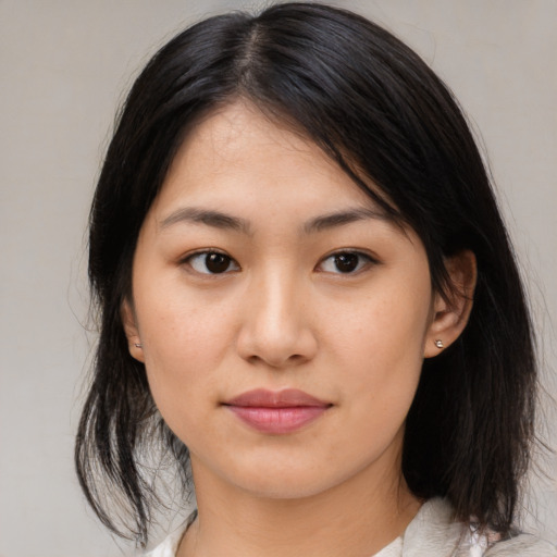 Neutral asian young-adult female with medium  brown hair and brown eyes