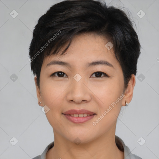 Joyful asian young-adult female with short  brown hair and brown eyes