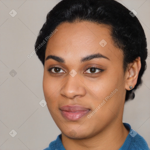 Joyful latino young-adult female with short  black hair and brown eyes