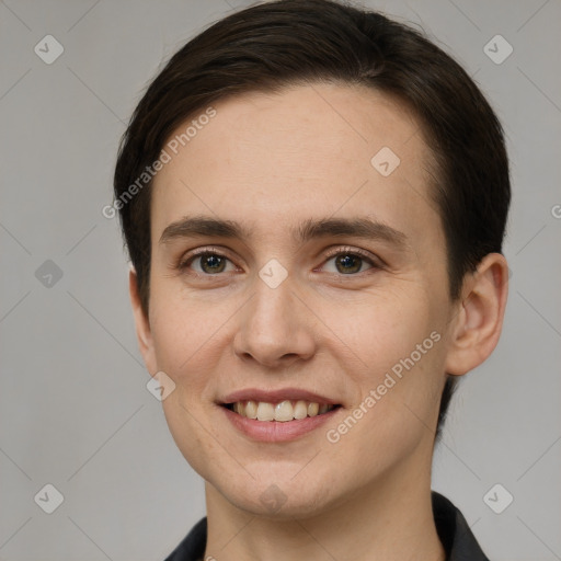 Joyful white young-adult female with short  brown hair and grey eyes