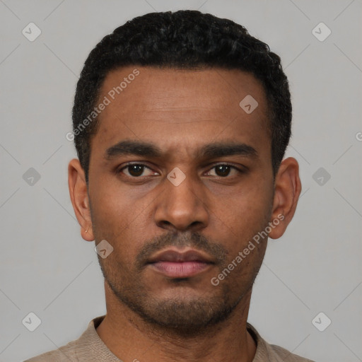 Neutral latino young-adult male with short  black hair and brown eyes