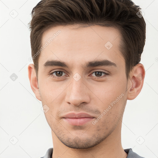 Neutral white young-adult male with short  brown hair and brown eyes