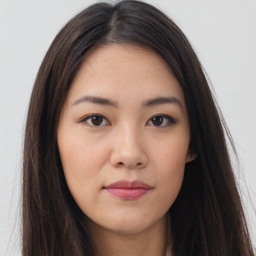 Neutral asian young-adult female with long  brown hair and brown eyes