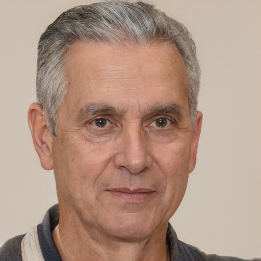 Neutral white middle-aged male with short  gray hair and brown eyes