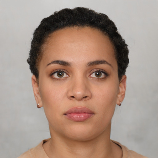 Neutral latino young-adult female with short  brown hair and brown eyes