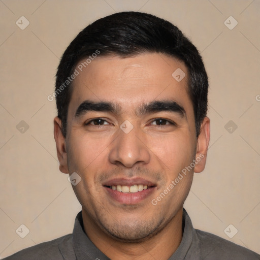 Joyful white young-adult male with short  black hair and brown eyes