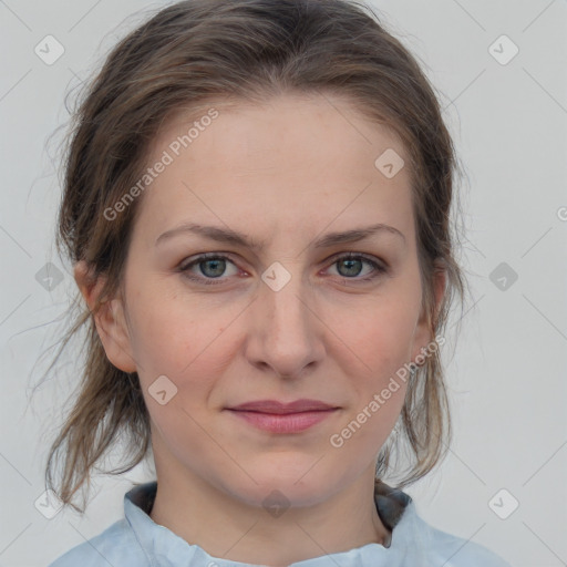 Joyful white young-adult female with medium  brown hair and blue eyes