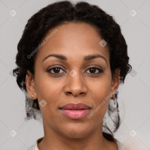 Joyful latino adult female with medium  brown hair and brown eyes