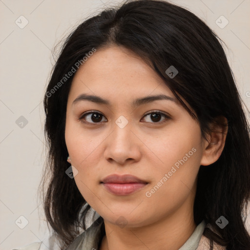 Joyful latino young-adult female with medium  brown hair and brown eyes