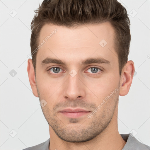 Neutral white young-adult male with short  brown hair and brown eyes