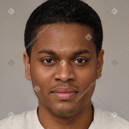 Joyful latino young-adult male with short  brown hair and brown eyes