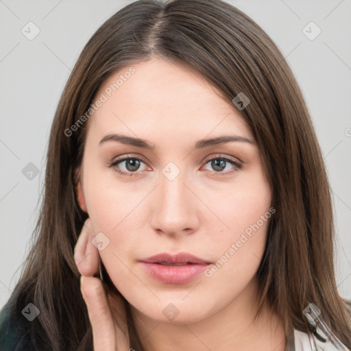 Neutral white young-adult female with medium  brown hair and brown eyes