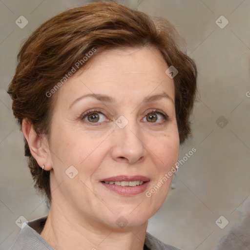 Joyful white adult female with medium  brown hair and grey eyes