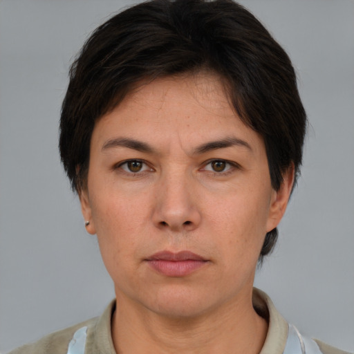 Neutral white adult female with short  brown hair and brown eyes