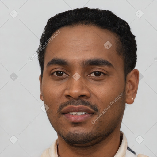 Neutral latino young-adult male with short  black hair and brown eyes