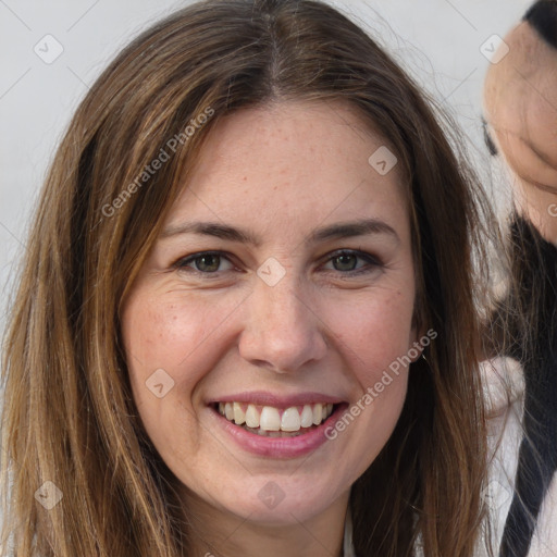 Joyful white young-adult female with long  brown hair and grey eyes