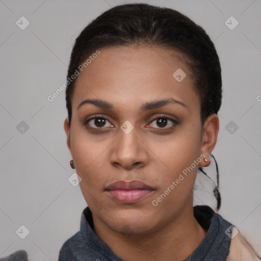 Neutral black young-adult female with short  black hair and brown eyes