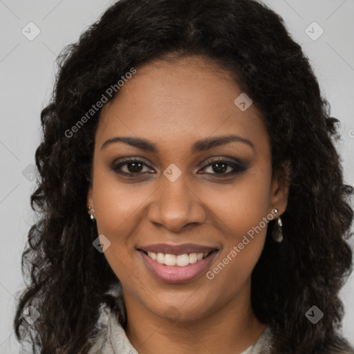 Joyful black young-adult female with long  brown hair and brown eyes