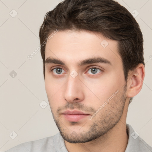 Neutral white young-adult male with short  brown hair and brown eyes