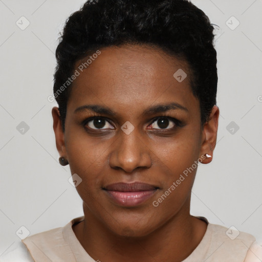 Joyful black young-adult female with short  black hair and brown eyes