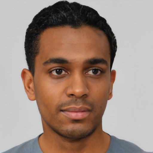 Neutral black young-adult male with short  black hair and brown eyes