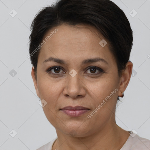 Joyful white adult female with short  brown hair and brown eyes