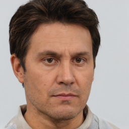 Neutral white adult male with short  brown hair and brown eyes