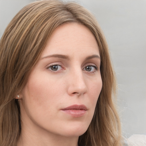 Neutral white young-adult female with long  brown hair and grey eyes